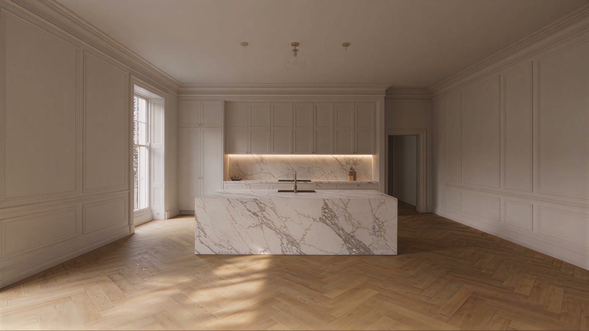 A marble island under three pendant lights